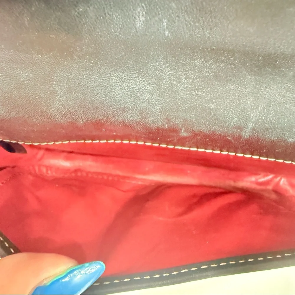 Dooney & Bourke Monogrammed Tan and Black Wristlet Clutch